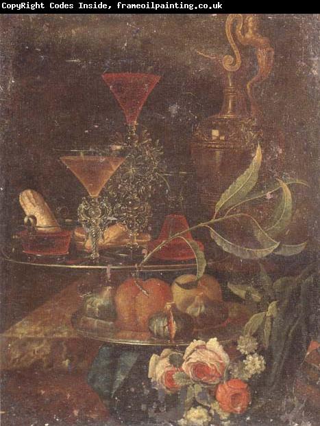 unknow artist Still Life of wine-glasses,a decanter,a glass bowl,sweet breads,figs and peaches upon pewter plates,together with a gilt ewer and flowers,all upon a m